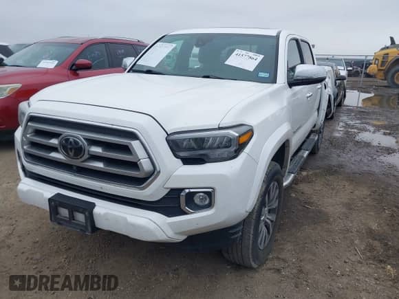 2021 Toyota Tacoma Limited with VIN 3TMGZ5AN1MM396485, listed as a IAAI auction lot 41577864 with 60,211 mi miles and . Bid and sale history available at DreamBid. Image 18.
