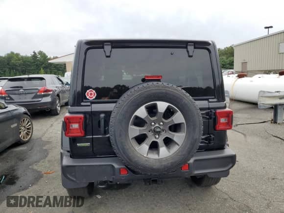 2021 Jeep Wrangler Unlimited Sahara High Altitude with VIN 1C4HJXEM9MW585183, listed as a Copart auction lot 71749574 with 21,526 mi miles and Salvage title. Bid and sale history available at DreamBid. Image 6.