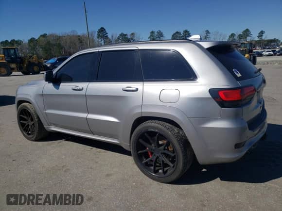 2016 Jeep Grand Cherokee SRT с VIN 1C4RJFDJ9GC358233, выставлен на аукционе Copart как лот 49211115 с пробегом 124 511 миль миль и Списание • Salvage title. История ставок и продаж доступна на DreamBid. Изображение 2.