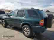1998 Honda Passport LX with VIN 4S6CM58W2W4403473, listed as a Copart auction lot 66621474 with 154,892 mi miles and Clean title. Bid and sale history available at DreamBid. Image 2.