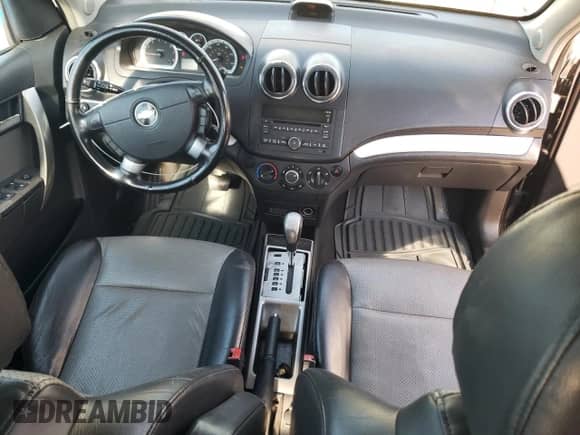 2009 Chevrolet Aveo 2LT z VIN KL1TG66E29B347370, wystawiony jako Copart lot #72695624 z przebiegiem 129 479 mil mil oraz Szkoda całkowita • Salvage title. Historia ofert i sprzedaży dostępna na DreamBid. Obrazek 8.