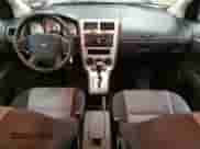 2009 Dodge Caliber SXT with VIN 1B3HB48A89D136949, listed as a Copart auction lot 90877325 with 174,077 mi miles and Clean title. Bid and sale history available at DreamBid. Image 8.