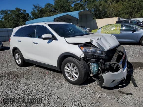 2019 Kia Sorento L with VIN 5XYPG4A3XKG515286, listed as a Copart auction lot 86478685 with 143,549 mi miles and Salvage title. Bid and sale history available at DreamBid. Image 4.
