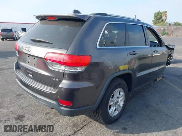 2017 Jeep Grand Cherokee Laredo with VIN 1C4RJEAG2HC605824, listed as a IAAI auction lot 43215690 with 111,643 mi miles and . Bid and sale history available at DreamBid. Image 4.