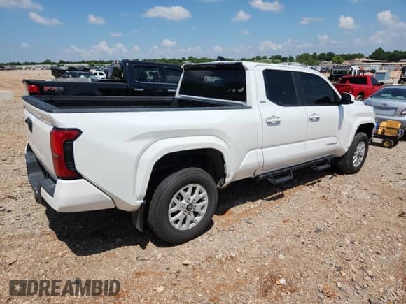 2024 Toyota Tacoma SR5 с VIN 3TYLB5JN6RT040080, выставлен на аукционе Copart как лот 63592565 с пробегом 7 596 миль миль и Списание • Salvage title. История ставок и продаж доступна на DreamBid. Изображение 3.
