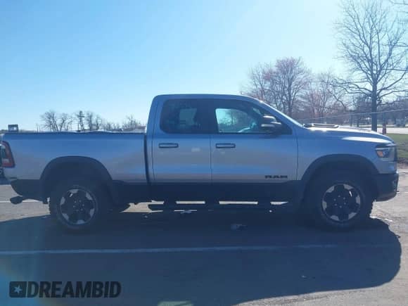 2019 Ram 1500 Rebel with VIN 1C6SRFET2KN671753, listed as a IAAI auction lot 41889166 with 72,883 mi miles and . Bid and sale history available at DreamBid. Image 14.