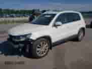 2013 Volkswagen Tiguan SE с VIN WVGAV7AX7DW555195, выставлен на аукционе Copart как лот 61065725 с пробегом 126 911 миль миль и Списание • Salvage title. История ставок и продаж доступна на DreamBid. Изображение 1.