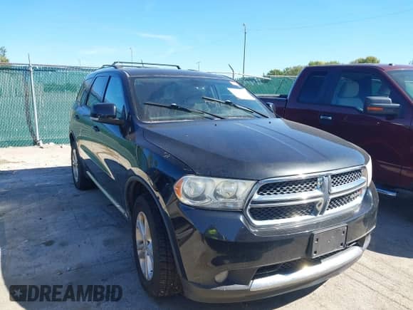 2011 Dodge Durango Crew with VIN 1D4RE4GG0BC599280, listed as a IAAI auction lot 43324291 with 240,181 mi miles and . Bid and sale history available at DreamBid. Image 1.