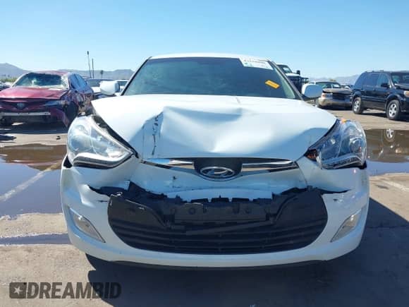 2014 Hyundai Veloster z VIN KMHTC6AD4EU213537, wystawiony jako IAAI lot #43358808 z przebiegiem 54 973 mil mil oraz . Historia ofert i sprzedaży dostępna na DreamBid. Obrazek 6.