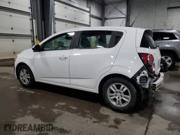 2014 Chevrolet Sonic LT with VIN 1G1JD6SH2E4126013, listed as a Copart auction lot 51694485 with 145,949 mi miles and Salvage title. Bid and sale history available at DreamBid. Image 2.