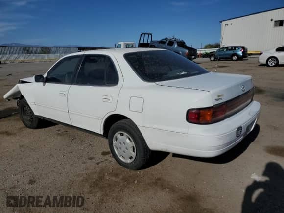 1992 Toyota Camry LE с VIN 4T1SK12E0NU064956, выставлен на аукционе Copart как лот 50665925 с пробегом 228 909 миль миль и Списание • Salvage title. История ставок и продаж доступна на DreamBid. Изображение 2.