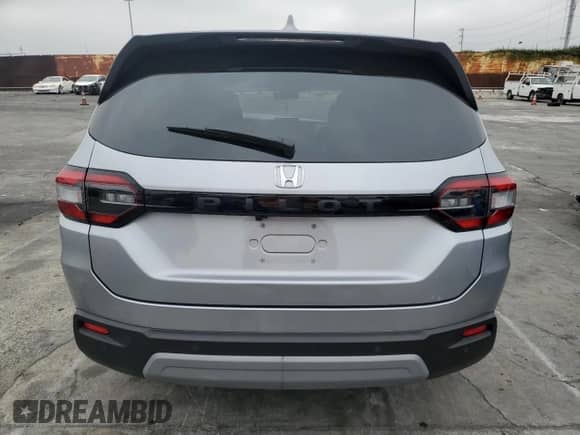 2025 Honda Pilot EX-L с VIN 5FNYG2H46SB021618, выставлен на аукционе Copart как лот 68954195 с пробегом 18 082 миль миль и Списание • Salvage title. История ставок и продаж доступна на DreamBid. Изображение 6.