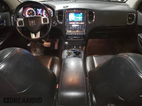 2012 Dodge Durango Crew with VIN 1C4SDJDT0CC323006, listed as a Copart auction lot 63631985 with 126,521 mi miles and Salvage title. Bid and sale history available at DreamBid. Image 8.