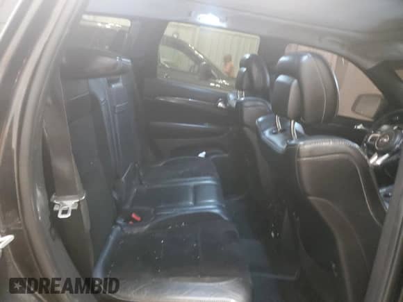 2012 Jeep Grand Cherokee SRT-8 z VIN 1C4RJFDJ9CC153408, wystawiony jako Copart lot #55477035 z przebiegiem 106 239 mil mil oraz Czysty tytuł • Clean title. Historia ofert i sprzedaży dostępna na DreamBid. Obrazek 11.