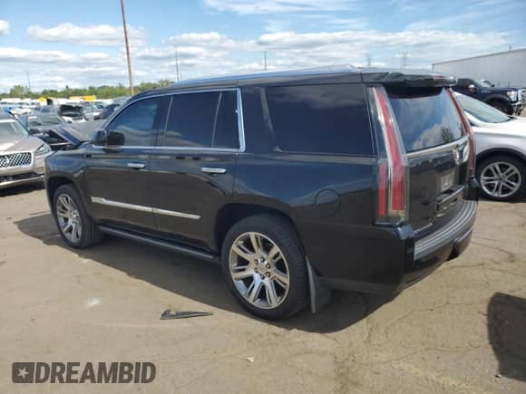 2015 Cadillac Escalade Premium с VIN 1GYS4CKJ0FR235033, выставлен на аукционе Copart как лот 70702655 с пробегом 135 891 миль миль и Чистый • Clean title. История ставок и продаж доступна на DreamBid. Изображение 2.