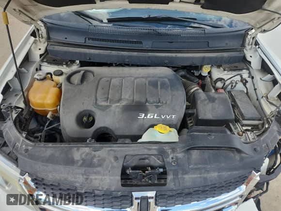 2011 Dodge Journey Mainstreet с VIN 3D4PG1FG8BT552343, выставлен на аукционе Copart как лот 70418475 с пробегом 127 277 миль миль и Списание • Salvage title. История ставок и продаж доступна на DreamBid. Изображение 12.