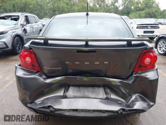 2014 Dodge Avenger SE z VIN 1C3CDZAB9EN200556, wystawiony jako IAAI lot #43288887 z przebiegiem 183 739 mil mil oraz . Historia ofert i sprzedaży dostępna na DreamBid. Obrazek 16.