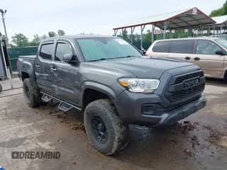 2020 Toyota Tacoma SR5 with VIN 3TMCZ5ANXLM291599, listed as a IAAI auction lot 42311990 with 92,609 mi miles and . Bid and sale history available at DreamBid. Image 1.