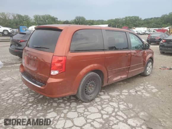 2012 Dodge Grand Caravan American Value with VIN 2C4RDGBG0CR281581, listed as a Copart auction lot 67387115 with 121,710 mi miles and Salvage title. Bid and sale history available at DreamBid. Image 3.
