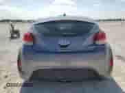 2013 Hyundai Veloster w/Black Int z VIN KMHTC6AD0DU094688, wystawiony jako Copart lot #87237165 z przebiegiem 81 433 mil mil oraz Szkoda całkowita • Salvage title. Historia ofert i sprzedaży dostępna na DreamBid. Obrazek 6.