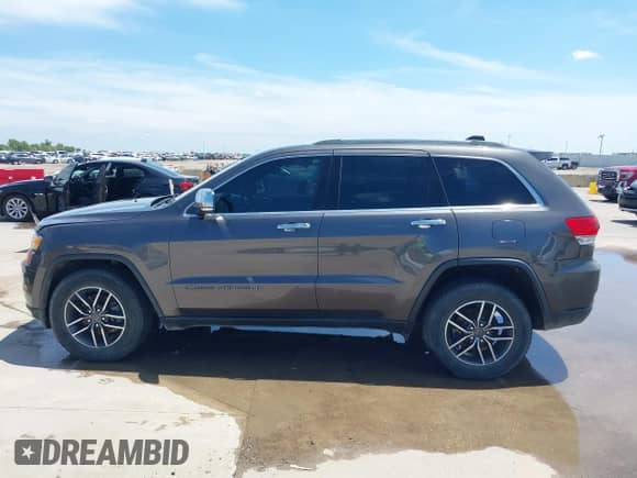 2019 Jeep Grand Cherokee Limited z VIN 1C4RJFBG7KC706787, wystawiony jako IAAI lot #42854692 z przebiegiem 88 321 mil mil oraz . Historia ofert i sprzedaży dostępna na DreamBid. Obrazek 14.