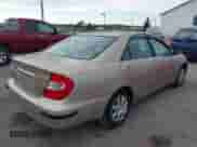 2002 Toyota Camry LE with VIN 4T1BE32K92U069870, listed as a IAAI auction lot 43498390 with 137,376 mi miles and . Bid and sale history available at DreamBid. Image 4.