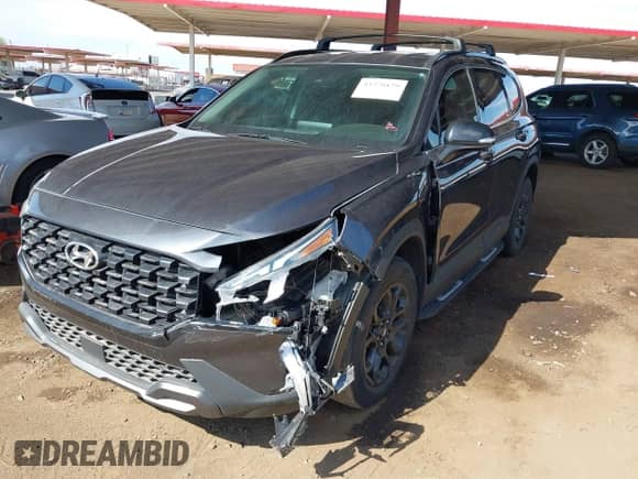 2022 Hyundai Santa Fe XRT z VIN 5NMS64AJ4NH383194, wystawiony jako IAAI lot #43270179 z przebiegiem 28 393 mil mil oraz . Historia ofert i sprzedaży dostępna na DreamBid. Obrazek 2.