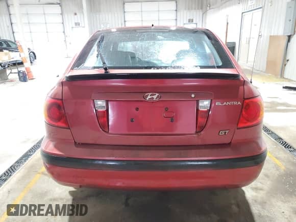 2003 Hyundai Elantra GT z VIN KMHDN55D23U082415, wystawiony jako Copart lot #45854355 z przebiegiem 165 657 mil mil oraz Szkoda całkowita • Salvage title. Historia ofert i sprzedaży dostępna na DreamBid. Obrazek 6.
