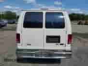 2013 Ford Econoline Cargo Commercial with VIN 1FTNE2EW3DDA46372, listed as a Copart auction lot 59529175 with 169,295 mi miles and Clean title. Bid and sale history available at DreamBid. Image 6.