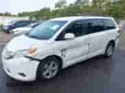 2016 Toyota Sienna LE AAS with VIN 5TDKK3DC8GS716418, listed as a IAAI auction lot 43328263 with 292,765 mi miles and . Bid and sale history available at DreamBid. Image 2.