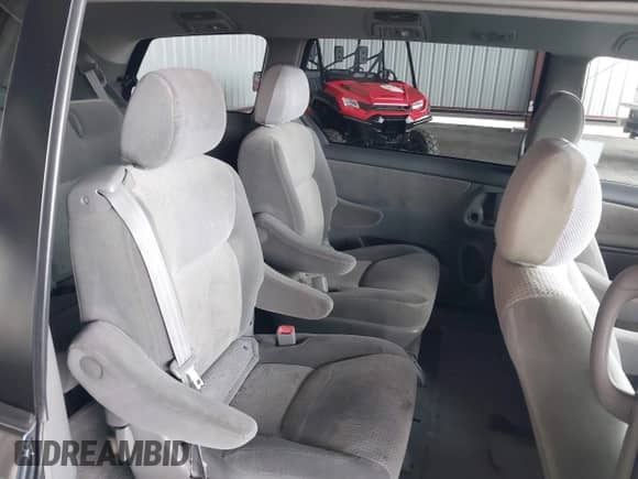 2008 Toyota Sienna LE z VIN 5TDZK23C08S146054, wystawiony jako IAAI lot #43534977 z przebiegiem 125 602 mil mil oraz . Historia ofert i sprzedaży dostępna na DreamBid. Obrazek 8.