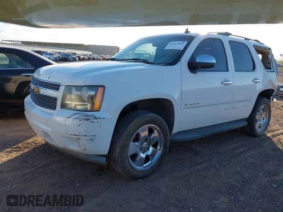 2007 Chevrolet Tahoe LT z VIN 1GNFC13J47R401432, wystawiony jako IAAI lot #43365042 z przebiegiem 216 974 mil mil oraz . Historia ofert i sprzedaży dostępna na DreamBid. Obrazek 2.