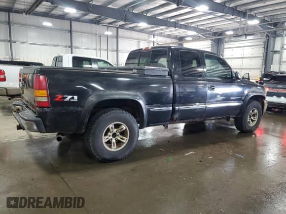 2002 GMC Sierra 1500 SLE with VIN 2GTEK19TX21220451, listed as a Copart auction lot 68935095 with 225,478 mi miles and Clean title. Bid and sale history available at DreamBid. Image 3.