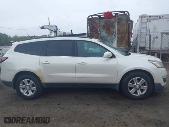 2013 Chevrolet Traverse LT with VIN 1GNKVJKD1DJ217693, listed as a IAAI auction lot 42189070 with 129,625 mi miles and . Bid and sale history available at DreamBid. Image 14.