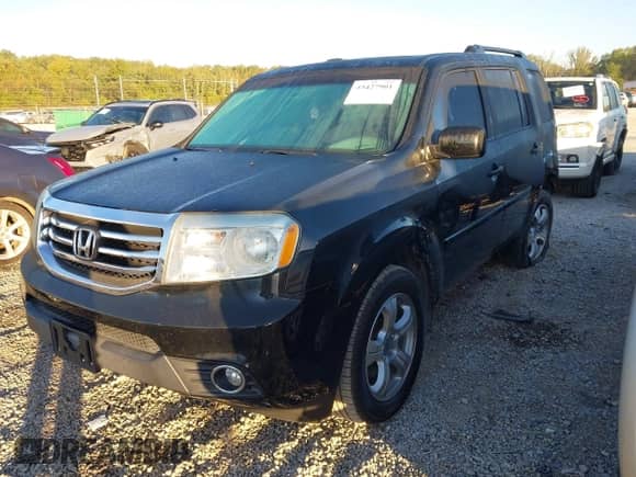 2015 Honda Pilot EX-L with VIN 5FNYF4H56FB052123, listed as a IAAI auction lot 43427901 with 197,741 mi miles and . Bid and sale history available at DreamBid. Image 18.
