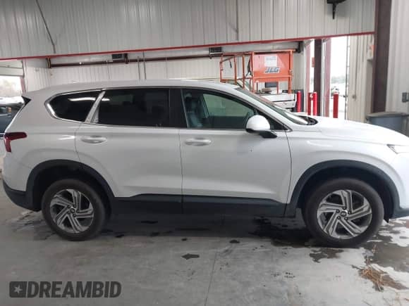 2021 Hyundai Santa Fe SE with VIN 5NMS1DAJ2MH352913, listed as a IAAI auction lot 43548098 with 93,758 mi miles and . Bid and sale history available at DreamBid. Image 13.