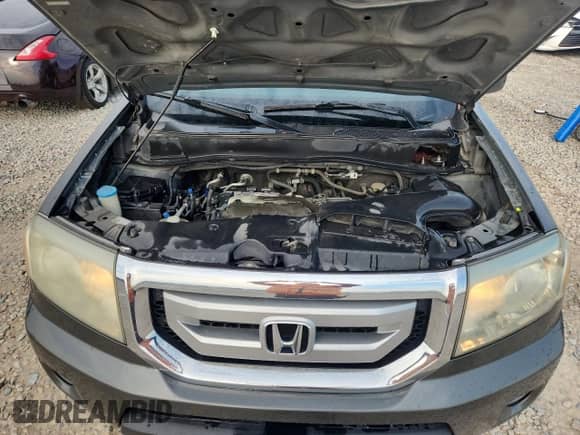 2009 Honda Pilot Touring with VIN 5FNYF48969B025883, listed as a Copart auction lot 70923065 with 192,552 mi miles and Salvage title. Bid and sale history available at DreamBid. Image 12.