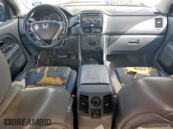 2006 Honda Pilot EX-L z VIN 5FNYF28586B021640, wystawiony jako Copart lot #82360855 z przebiegiem 163 555 mil mil oraz Szkoda całkowita • Salvage title. Historia ofert i sprzedaży dostępna na DreamBid. Obrazek 8.