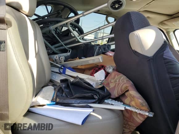 2004 Chevrolet Tahoe LS with VIN 1GNEC13T44R294049, listed as a Copart auction lot 59900565 with 149,379 mi miles and Salvage title. Bid and sale history available at DreamBid. Image 11.