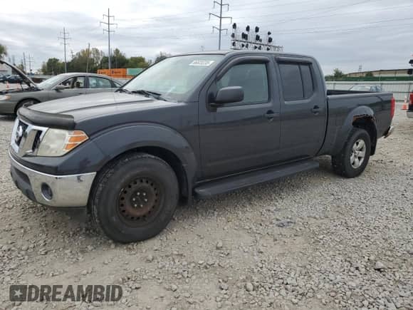 2010 Nissan Frontier SE with VIN 1N6AD0FV6AC441351, listed as a Copart auction lot 86820235 with 207,384 mi miles and Clean title. Bid and sale history available at DreamBid. Image 1.