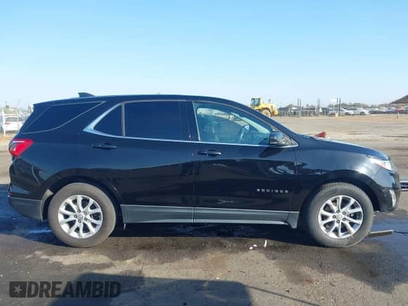 2019 Chevrolet Equinox LT z VIN 2GNAXKEV0K6280844, wystawiony jako IAAI lot #43310081 z przebiegiem 151 524 mil mil oraz . Historia ofert i sprzedaży dostępna na DreamBid. Obrazek 14.