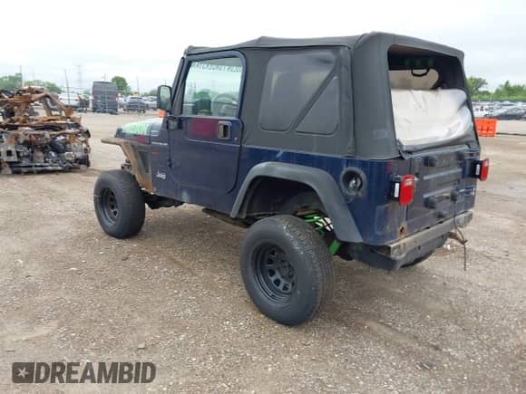 2000 Jeep Wrangler SE with VIN 1J4FA29P4YP740134, listed as a IAAI auction lot 42772253 with 168,656 mi miles and . Bid and sale history available at DreamBid. Image 3.