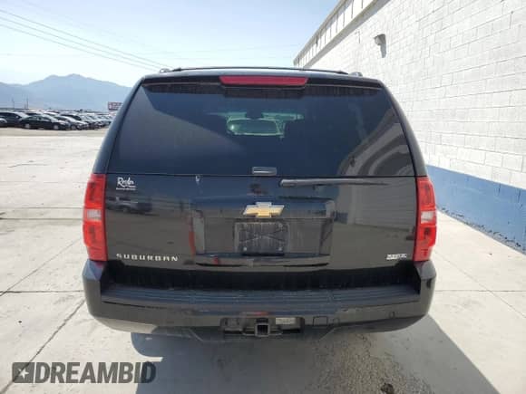 2009 Chevrolet Suburban 2LT with VIN 1GNFK26399R300007, listed as a Copart auction lot 61559815 with 195,033 mi miles and Salvage title. Bid and sale history available at DreamBid. Image 6.
