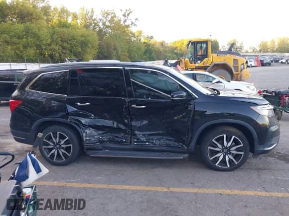 2020 Honda Pilot Touring 8-Passenger с VIN 5FNYF5H94LB009548, выставлен на аукционе IAAI как лот 43338596 с пробегом 46 151 миль миль и . История ставок и продаж доступна на DreamBid. Изображение 13.