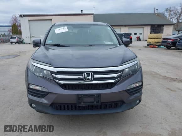 2017 Honda Pilot EX-L z VIN 5FNYF6H52HB024950, wystawiony jako IAAI lot #42051084 z przebiegiem Nie podano mil oraz . Historia ofert i sprzedaży dostępna na DreamBid. Obrazek 11.