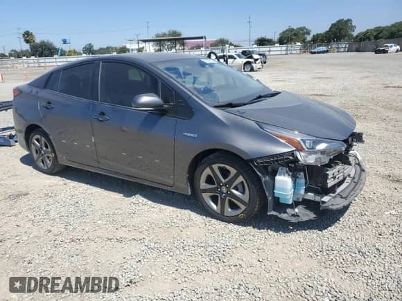 2019 Toyota Prius L Eco с VIN JTDKARFU2K3090595, выставлен на аукционе Copart как лот 69385105 с пробегом 195 378 миль миль и Списание • Salvage title. История ставок и продаж доступна на DreamBid. Изображение 4.