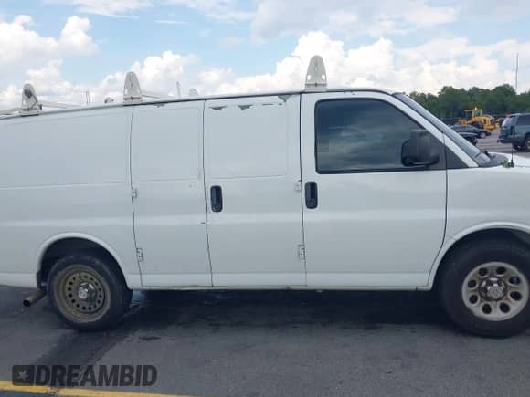 2011 Chevrolet Express Cargo with VIN 1GCSGAFX5B1125863, listed as a IAAI auction lot 42799239 with 244,007 mi miles and . Bid and sale history available at DreamBid. Image 14.