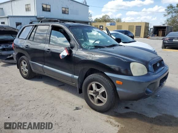 2002 Hyundai Santa Fe GLS с VIN KM8SC13D72U190570, выставлен на аукционе Copart как лот 77257524 с пробегом 244 808 миль миль и Списание • Salvage title. История ставок и продаж доступна на DreamBid. Изображение 4.