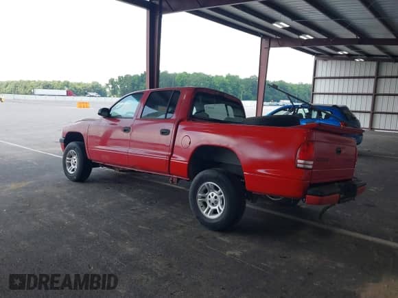 2001 Dodge Dakota Sport with VIN 1B7HG2AN61S308252, listed as a IAAI auction lot 42592638 with 180,306 mi miles and . Bid and sale history available at DreamBid. Image 3.