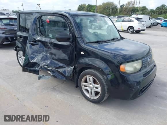 2009 Nissan Cube SL с VIN JN8AZ28R59T103584, выставлен на аукционе IAAI как лот 41685022 с пробегом 158 810 миль миль и . История ставок и продаж доступна на DreamBid. Изображение 1.